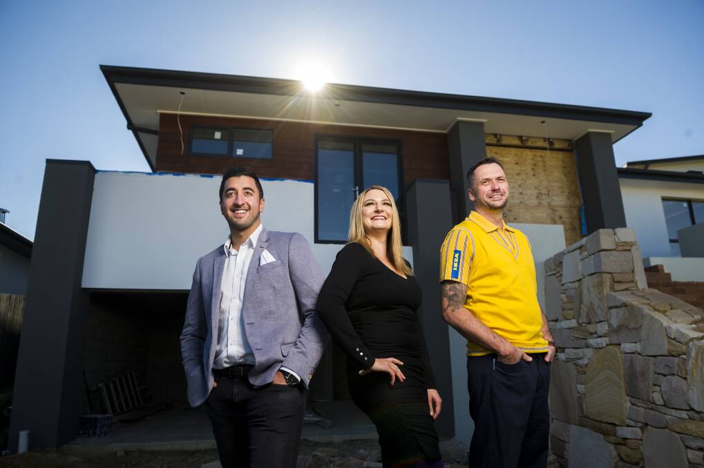 Former big brother contestant Jason Roses, raize the roof co-founder Danielle Dal Cortivo, and store manager of Ikea Canberra Sean Howell. Photo: Dion Georgopoulos