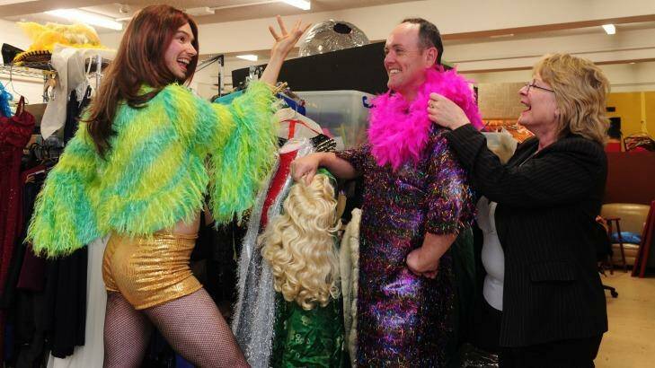 From left,  actors David Santolin and Ben O'Reilly with costume designer Suzan Cooper among costumes for <i>La Cage Aux Folles</i>. Photo: Melissa Adams