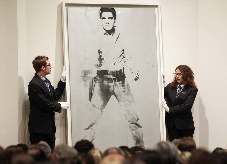 Andy Warhol’s portrait of Elvis Presley is auctioned at Sotheby's in New York City. Photo: Mario Tama