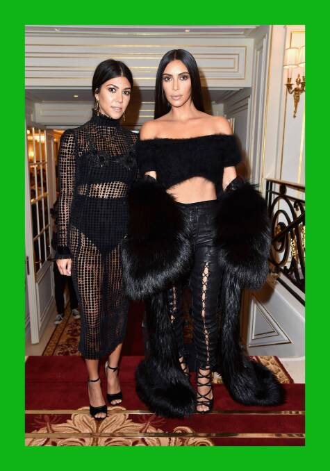 Kim Kardashian West, right, with her sister Kourtney. Photo: Getty Images