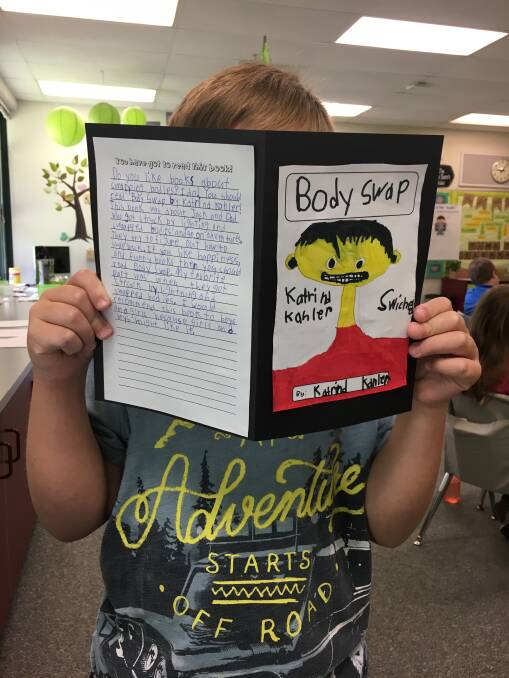 A school student from Illinois in the USA gets immersed in his book review of Body Swap. Photo: Katrina Kahler