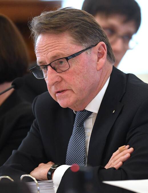 Under Treasurer Jim Murphy says people go to extraordinary lengths to avoid paying debts. Photo: AAP
