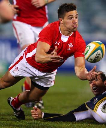Rhys Webb of Wales manages to offload. Photo: Getty Images