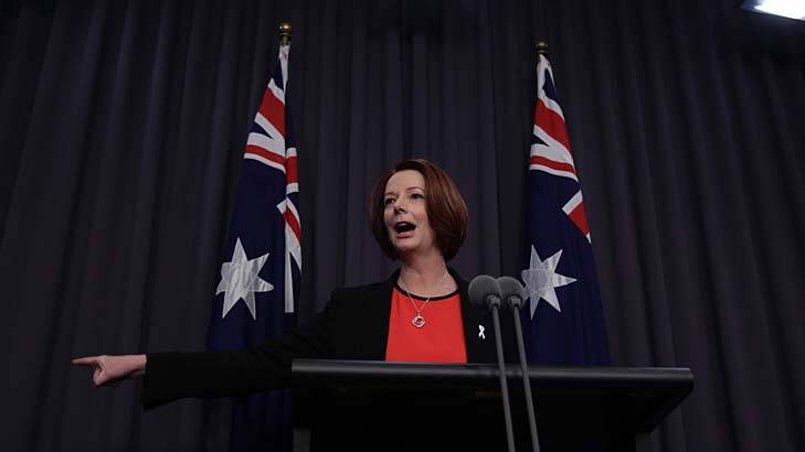 Prime Minister Julia Gillard takes questions from the media on her time as solicitor in the 1990s. Photo: Alex Ellinghausen 