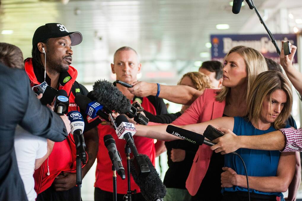 Inappropriate: Chris Gayle faces the media at Melbourne airport. Photo: Josh Robenstone