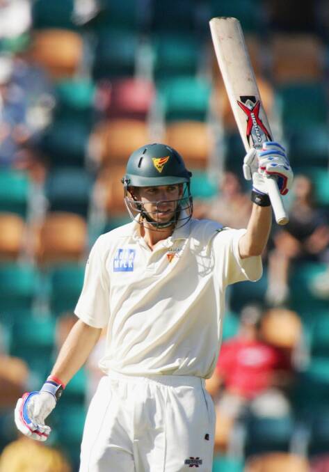 Luke Butterworth, pictured celebrating 50 runs for Tasmania during the Pura Cup Final in 2007, is moving to Canberra. Photo: Jonathan Wood