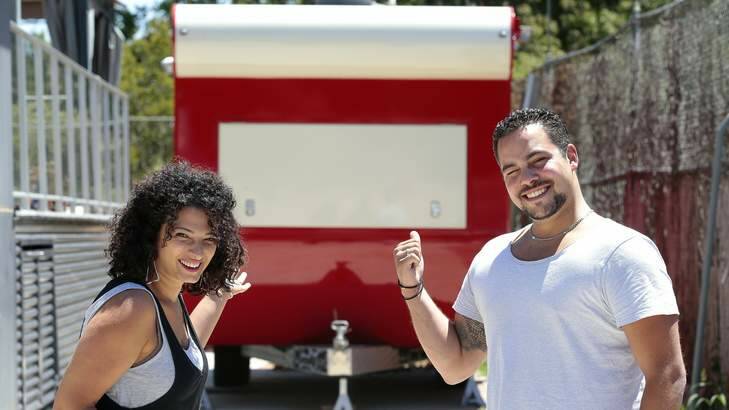 Joelle Brodbeck and Sascha Brodbeck in front of the refurbished Brodburger van that will hit the Canberra streets again as BrodDogs for this year's Multicultural Festival. Photo: Jeffrey Chan