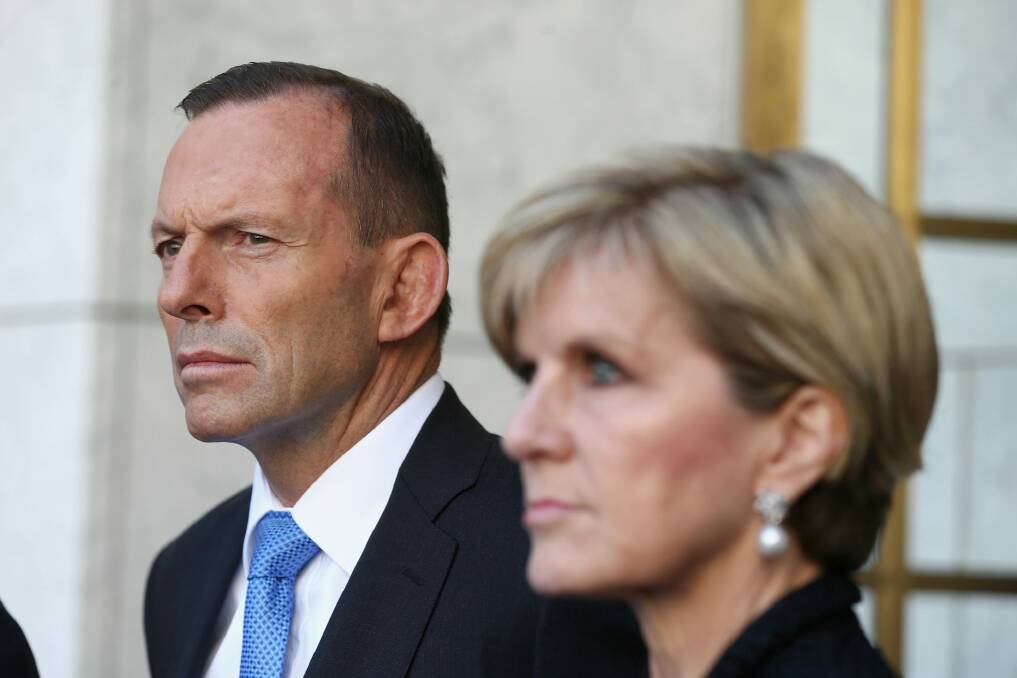 Foreign Minister Julie Bishop with former prime minister Tony Abbott. Photo: Alex Ellinghausen