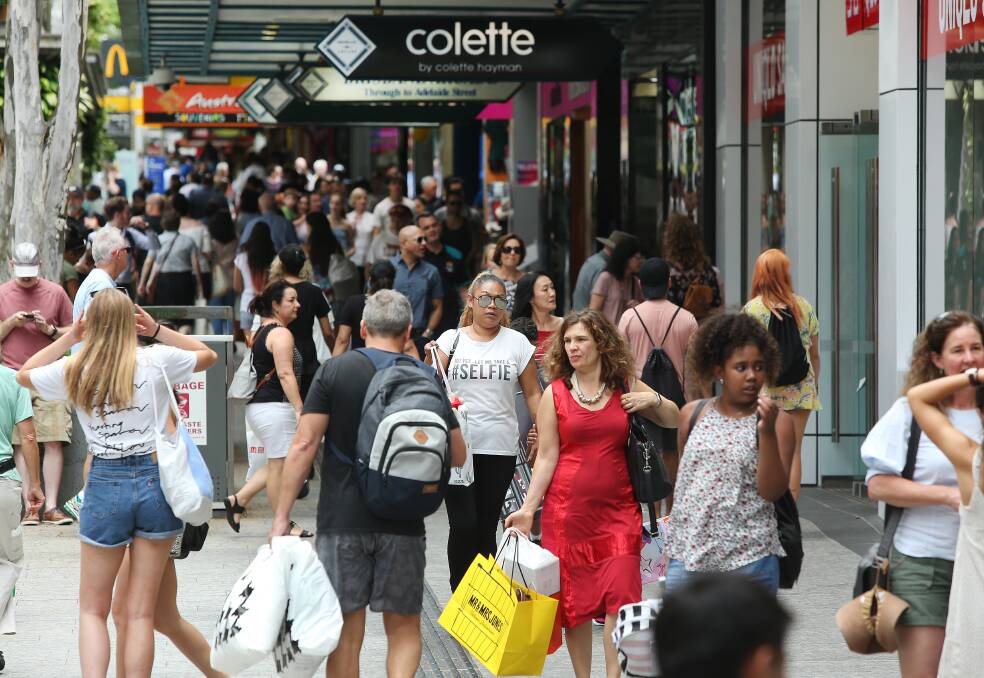 Christmas shopping in Brisbane's Queen Street Mall, where retail space costs thousands per square metre. Photo: Jono Searle/AAP