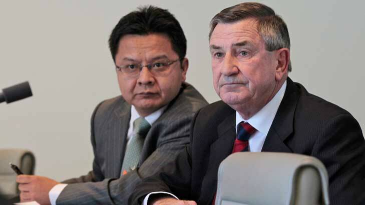 Huawei Chairman John Lord and executive David Wang. Photo: Andrew Meares