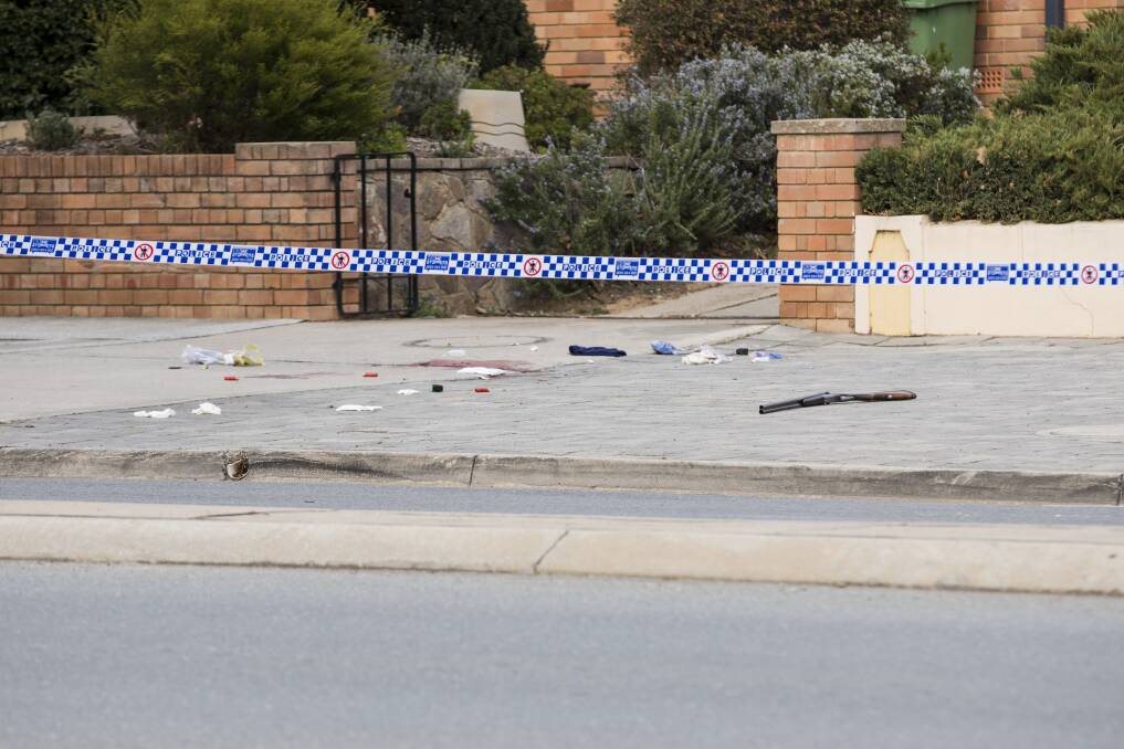 A double-barrel shotgun, which remained visible on Lowe Street, in Queanbeyan, for several hours after the incident on Saturday morning. Photo: Jamila Toderas