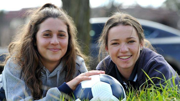 Grace Maher, 15, right, and Julia De Angelis, 16, are the two new additions to the Canberra United squad. Photo: Graham Tidy