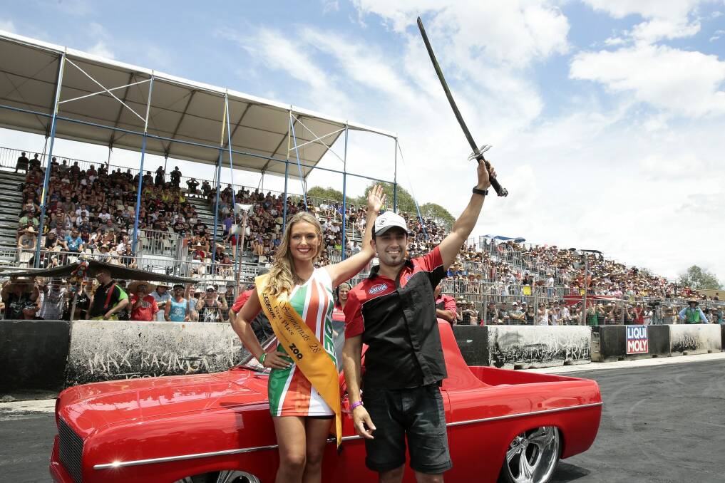Miss Summernats Monique Dignan-Smith with Grand Champion Nathan Borg on day 4 of Summernats 2015. Photo: Jeffrey Chan