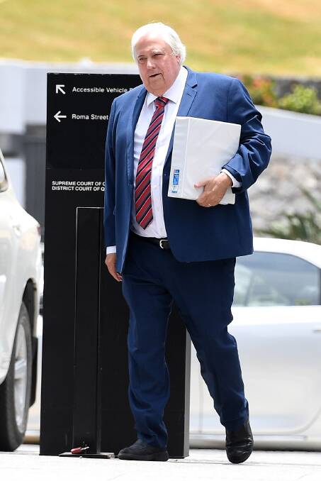 Businessman Clive Palmer arrives at the Supreme Court in Brisbane on December 4. Photo: AAP Image/ Dan Peled