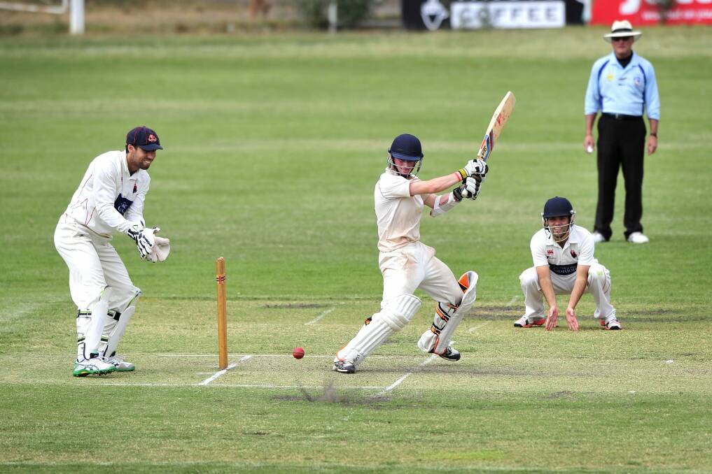 Weston Creek Molonglo batsman Mac Wright plays a shot on the first day of the Douglas Cup semi-final against Eastlake at Kingston Oval on Friday. Photo: Jeffrey Chan