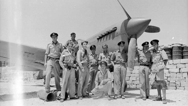 Tom Russell, centre, kneeling, with fellow RAAF Kittyhawk pilots in Malta, 1943. Photo: Karleen Minney