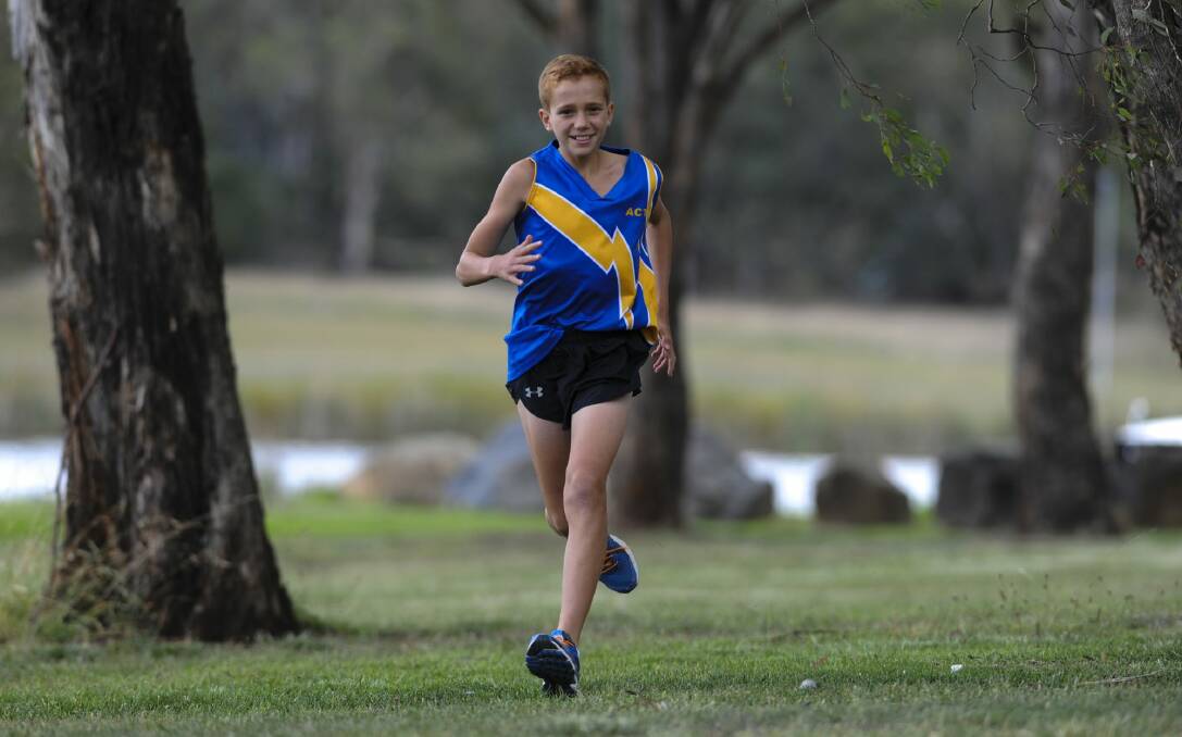 Elijah Arranz of Flynn, at the age of 12, set a target to run a minimum of one mile a day for one year.  Photo: Graham Tidy