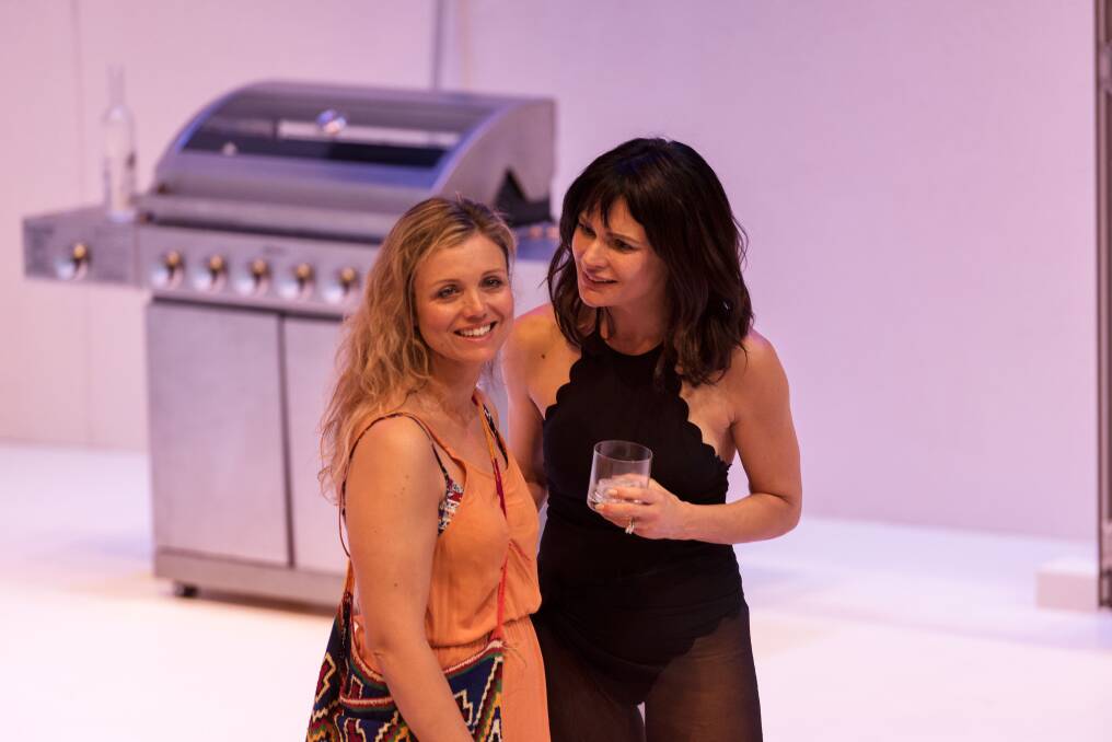 It’s not often an Ibsen production includes a steak on the barbecue says Danielle
Cormack who plays Hedda (right) with Bridie Carter as Thea Elvsted. Photo: Dylan Evans
