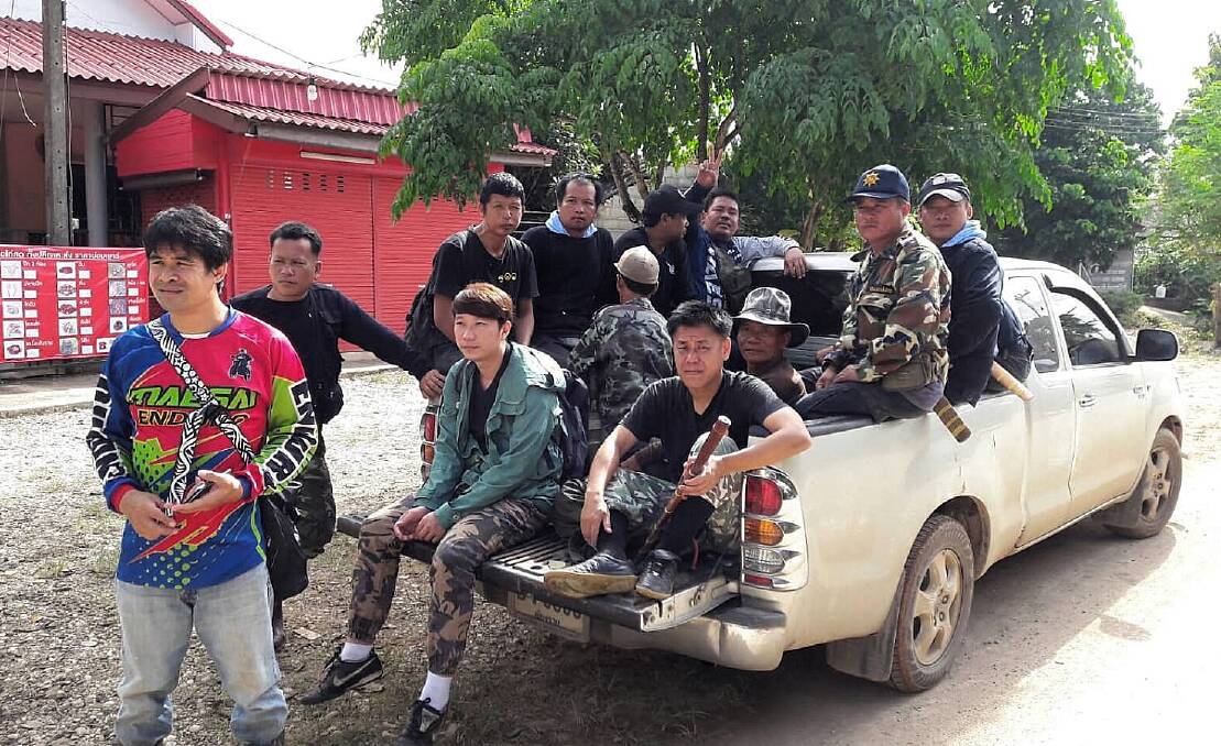 Members of the Thai military, Forest Rangers and birds' nest team at base camp. Photo: Supplied