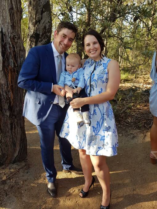 Hugh and Lorrae Paterson, of Jerrabomberra, with their son Elliot, who was diagnosed with hearing loss at four weeks of age. Photo: Supplied