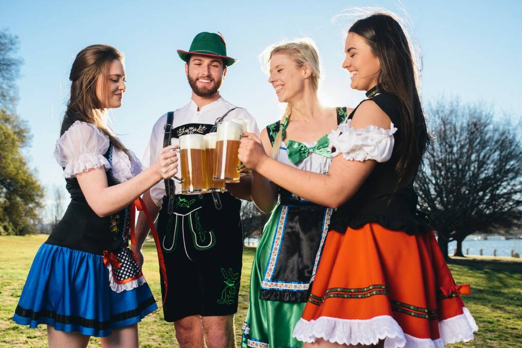 Maddie Welsh, Patrick Gallagher, Zoe Kooyman, and Carly Farmington enjoying a stein at the Patrick White Lawns in Parkes ahead of the new Oktoberfest Parklands. Photo: Rohan Thomson