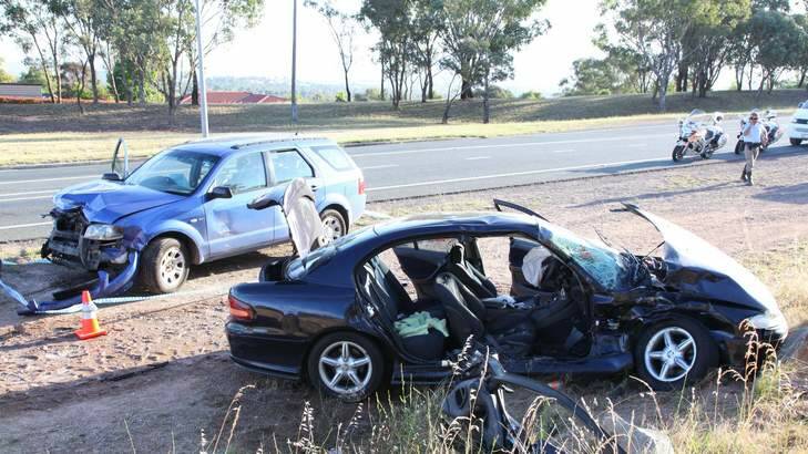 A seriously injured man was trapped inside his burning vehicle after it was hit by the driver of a stolen car in Kambah. Photo: Supplied