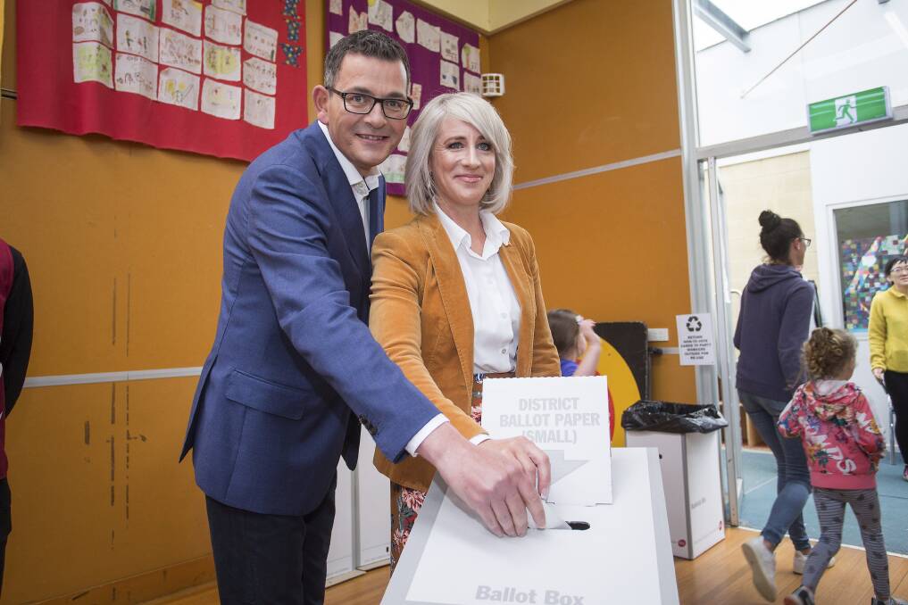 Daniel Andrews and his wife Cath cast their votes in Mulgrave on Saturday morning.  Photo: Paul Jeffers