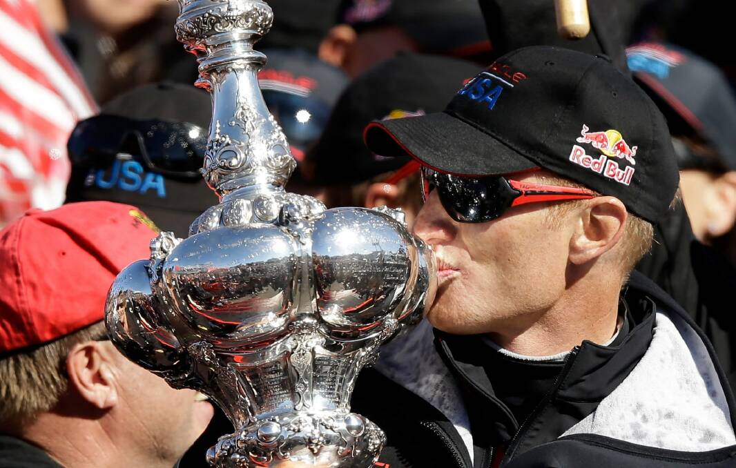 Triumph: James Spithill kisses the Auld Mug after winning the America's Cup with Oracle Team USA in San Francisco. Photo: Getty Images