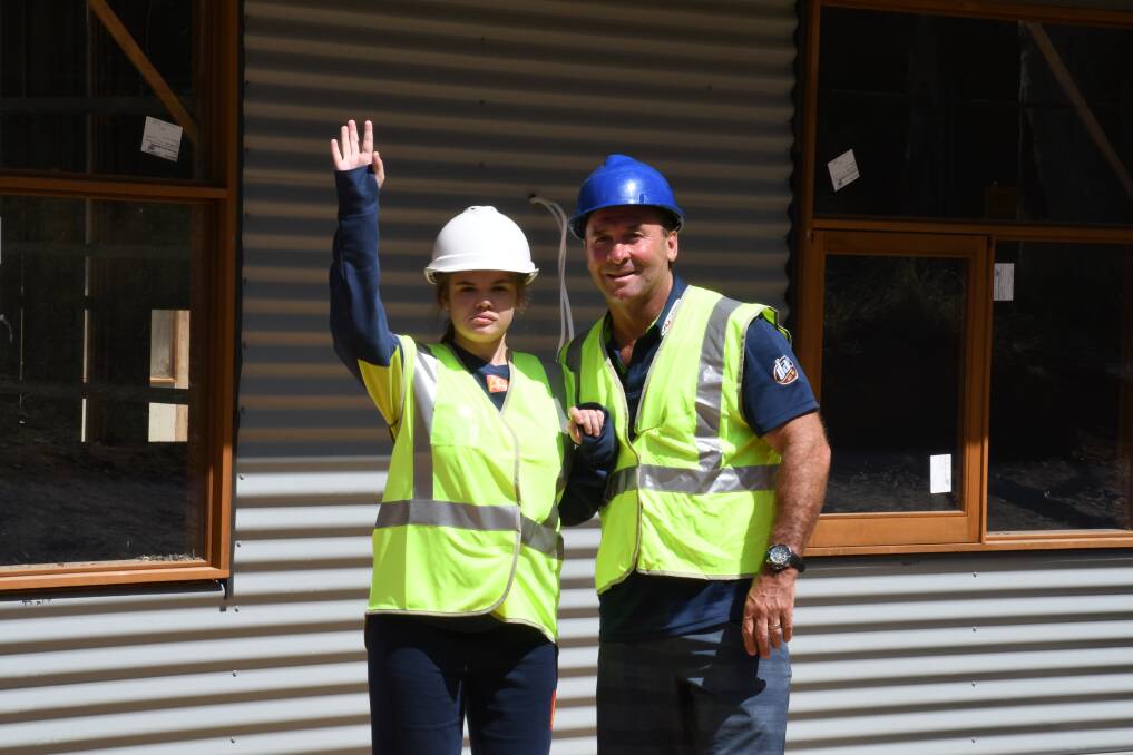 Ricky Stuart with daughter Emma at construction of the new respite centre. Photo: Supplied