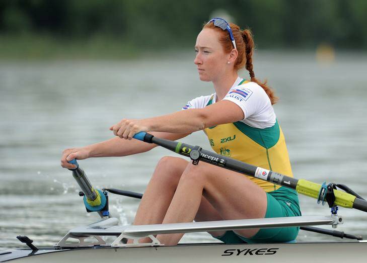 Olympic rowing hopeful Sarah Cook  trains on Lake Burley Griffin. Photo: Graham Tidy