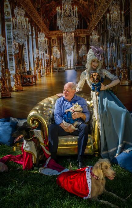 NGA director Gerard Vaughan, Marie Antoinette (aka Claire Mackey) and canine friends, dressed up like French royalty. Photo: Karleen Minney