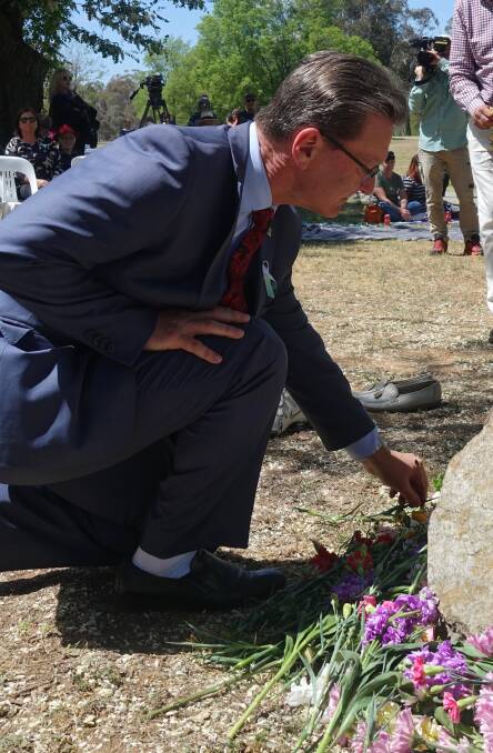ACT Attorney General Gordon Ramsay laying flowers for drug victims. Photo: Steve Evans.