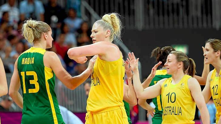 Opals captain Lauren Jackson greets Brazil's Nadia Colhado (number 13) following their London Olympics preliminary match. Photo: Getty Images
