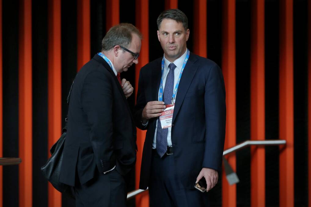 Shadow immigration minister Richard Marles with right wing factional operative David Feeney the ALP National Conference in Melbourne on Friday. Photo: Andrew Meares
