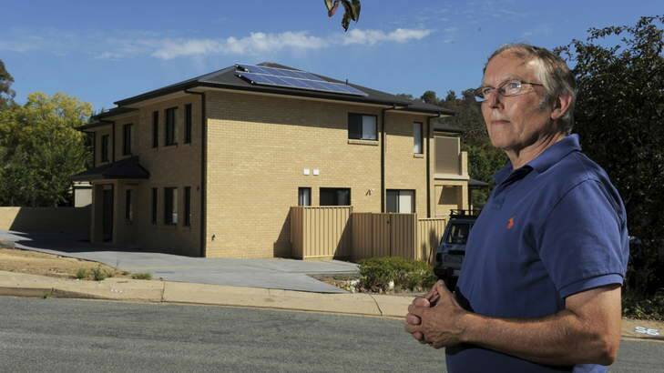 A new home in Gawler Crescent, Deakin, has upset some residents of the suburb, as it not in fitting with the landscape. President of the Deakin Residents' Association, Peter Wurfel, is one of those residents unhappy with the home. Photo: Graham Tidy
