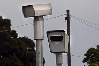 Police and Transport and Main Roads have chosen eight intersections for new combined red light and speed camera systems. Photo: Rob Carew