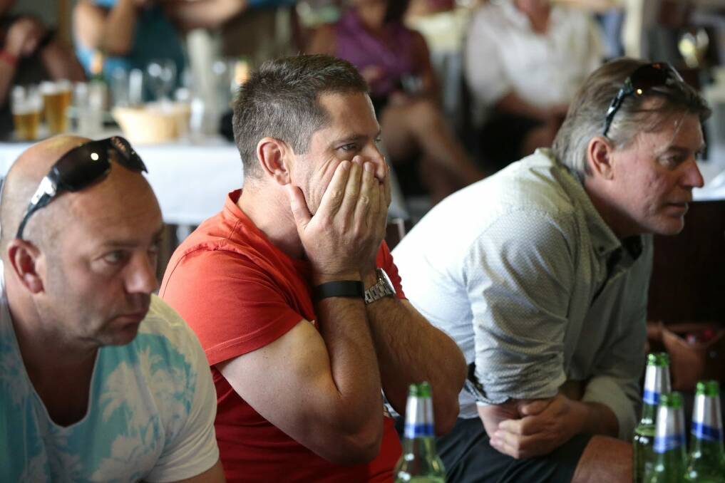 Matt Millar's supporters gathered at the Gold Creek Country Club to watch the last round of the Australian Open. From left, Simon Lovering of Casey, John Kiley of Nicholls and Matt Smith of Nicholls. Photo: Jeffrey Chan