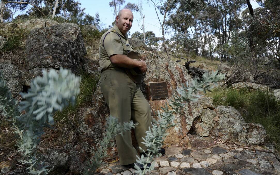 Indigenous Australian Army chaplain, Ivan Grant, at the
Indigenous War Memorial on Mt Ainslie, behind the Australian War
Memorial. Photo: Graham Tidy