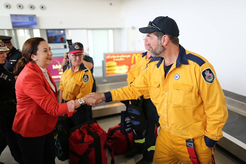 Queensland Premier Annastacia Palaszczuk thanking New South Wales firefighters in Gladstone. Photo: Jack Tran/ Office of the Premier