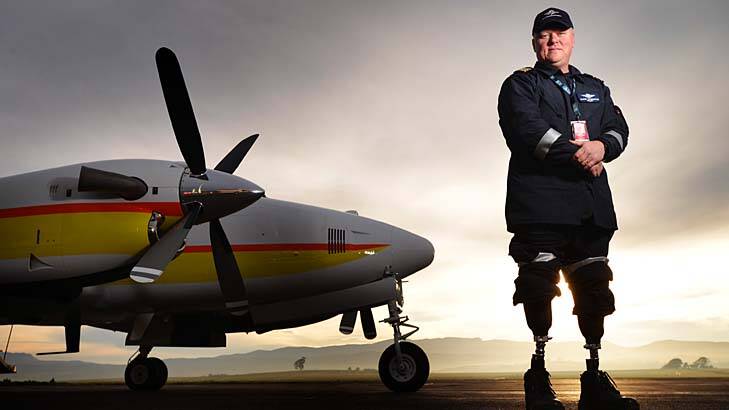 Almost a year after the crash, double amputee pilot Glenn Todhunter was able to walk independently again. Photo: Scott Gelston
