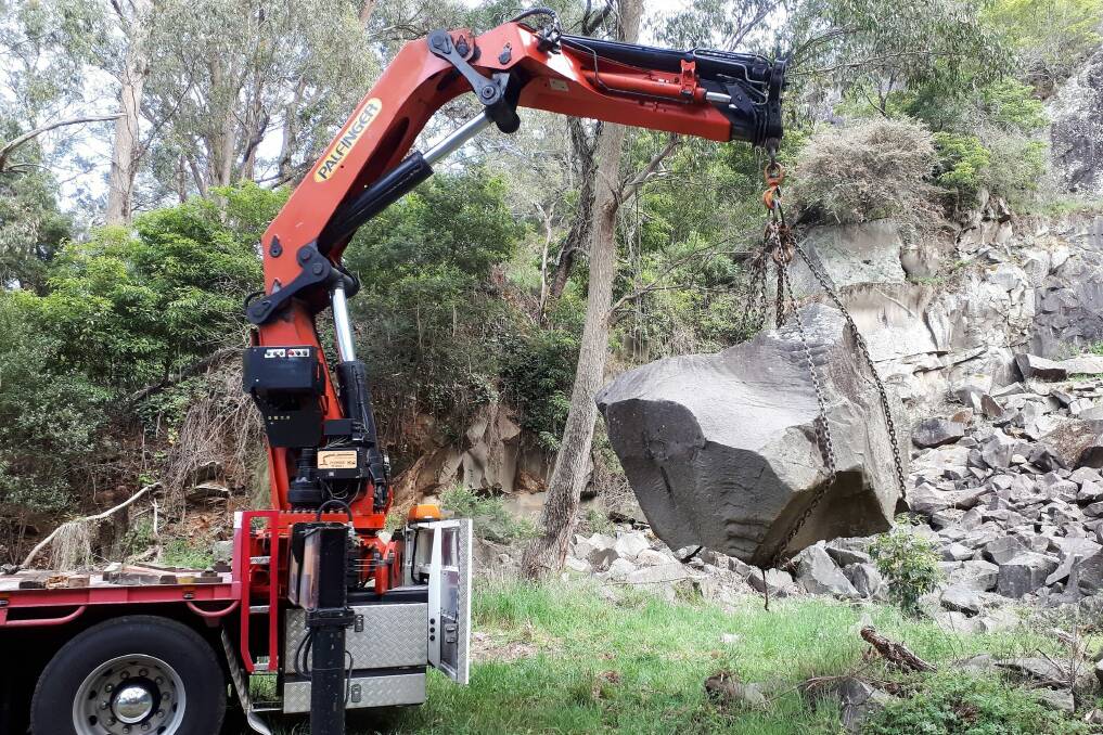 This rock specimen from Bowral's Mt Gibraltar starts its journey to the Canberra Rock Garden. Photo: Mike Smith