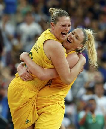 Lauren Jackson, right, celebrates with teammate Suzy Batkovic after the Opals claimed the women's basketball bronze medal. Photo: Getty Images
