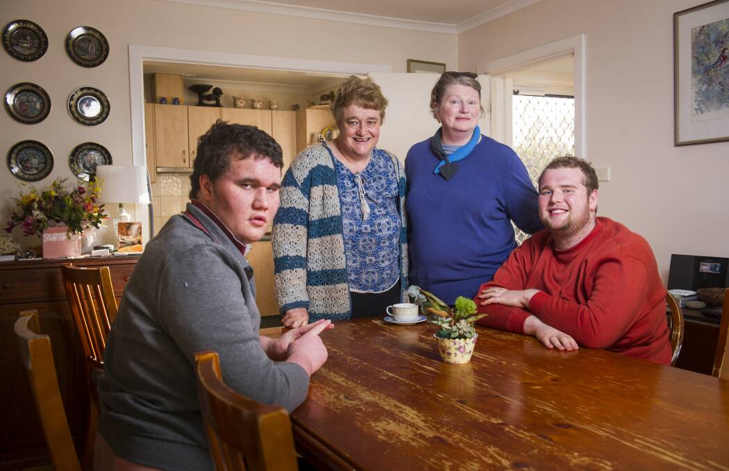 Mothers, Karna O'Dea (back left) and Sandra Blaik with their boys Malcolm O'Dea (left) and Rohan Delahoy want to set up a special community house where the boys can live and receive care after their parents are gone. Photo: Elesa Kurtz