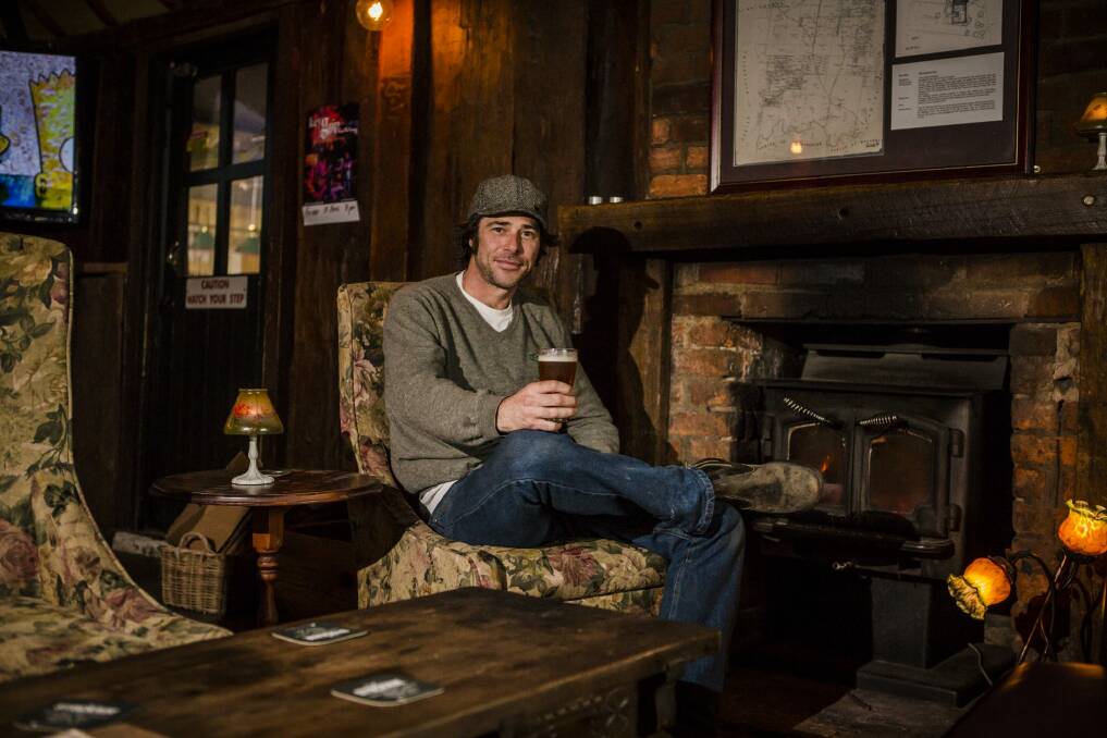Old Canberra Inn co-owner Nick Diver relaxes with a drink. Photo: Jamila Toderas
