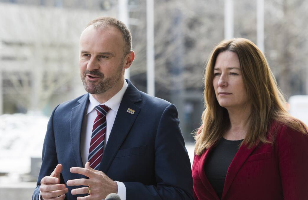 Chief Minister Andrew Barr flanked by deputy chief minister Yvette Berry. Photo: Elesa Kurtz