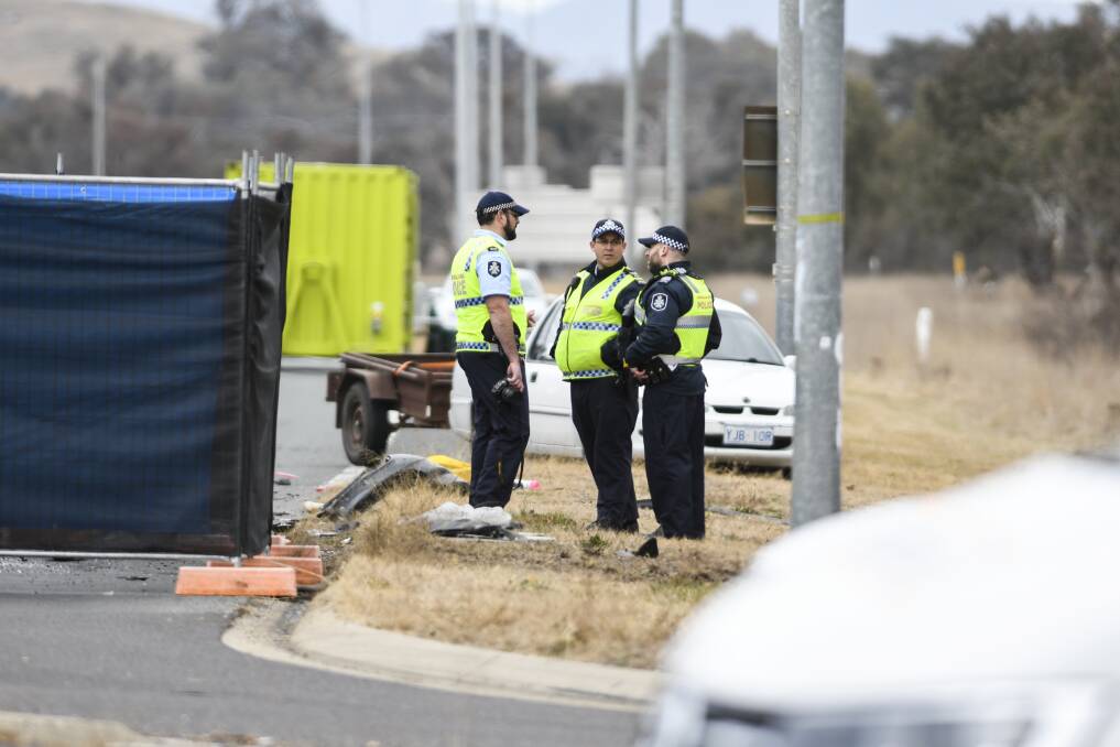 Police at the scene of a fatal crash on the Monaro Highway on Saturday. Photo: Dion Georgopoulos