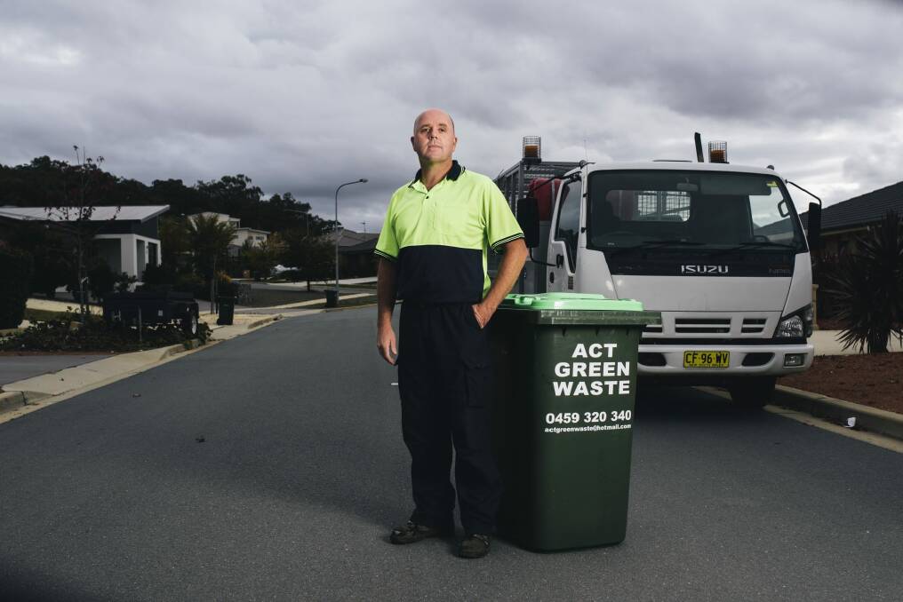 ACT Green Waste boss Rod Tarlinton is concerned about the viability of his business now that the ACT Government has announced it will introduce a green waste bin, starting in Kambah and Weston Creek early next year. Environment Minister Simon Corbell assured him in January a third bin was unlikely to happen in the ACT. Photo: Rohan Thomson