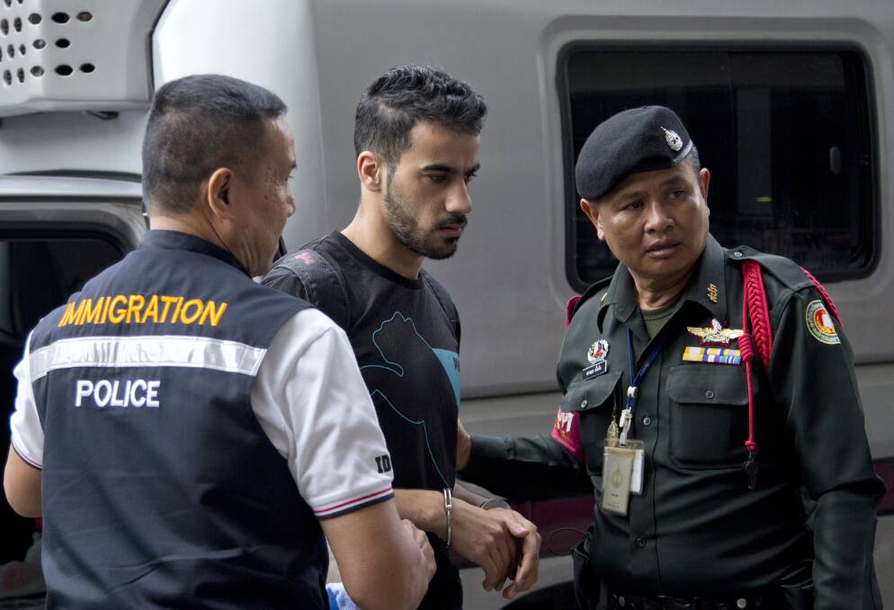 Bahraini football player Hakeem al-Araibi, centre, is brought in to a court in Bangkok, Thailand, on Tuesday.  Photo: AP