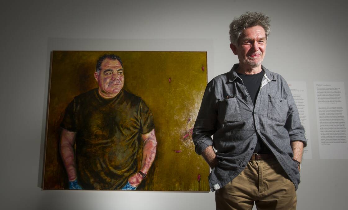 Artist Peter Hudson and his portrait of Mal Meninga.  Photo: Elesa Kurtz