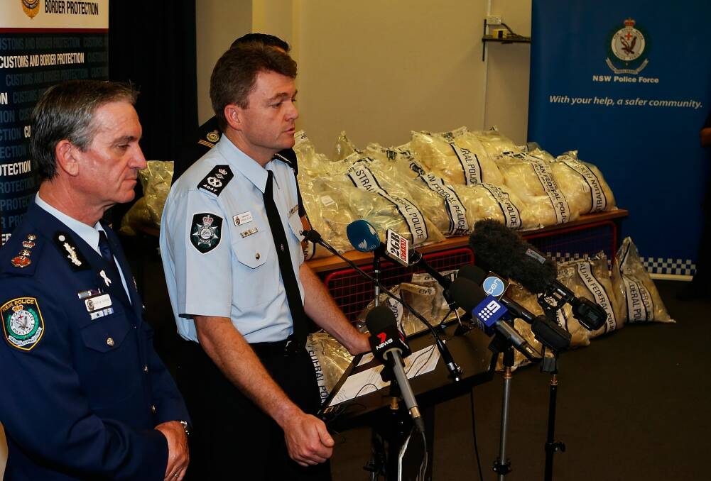 Then NSW police commissioner Andrew Scipione and AFP Commissioner Andrew Colvin present a drug haul to media in 2014. Photo: DANIEL MUNOZ/Fairfax Australia